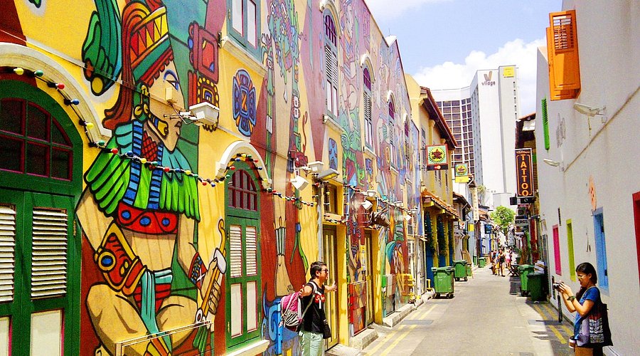 Bugis Arab Street night lights with cafes and murals