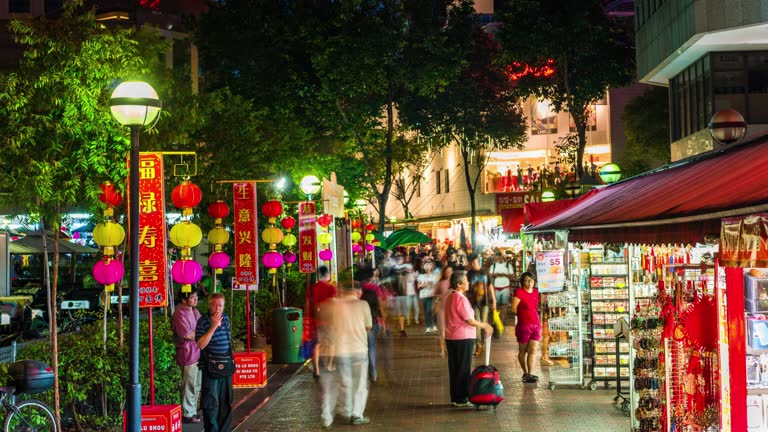 Bugis district evening view with lights and crowds